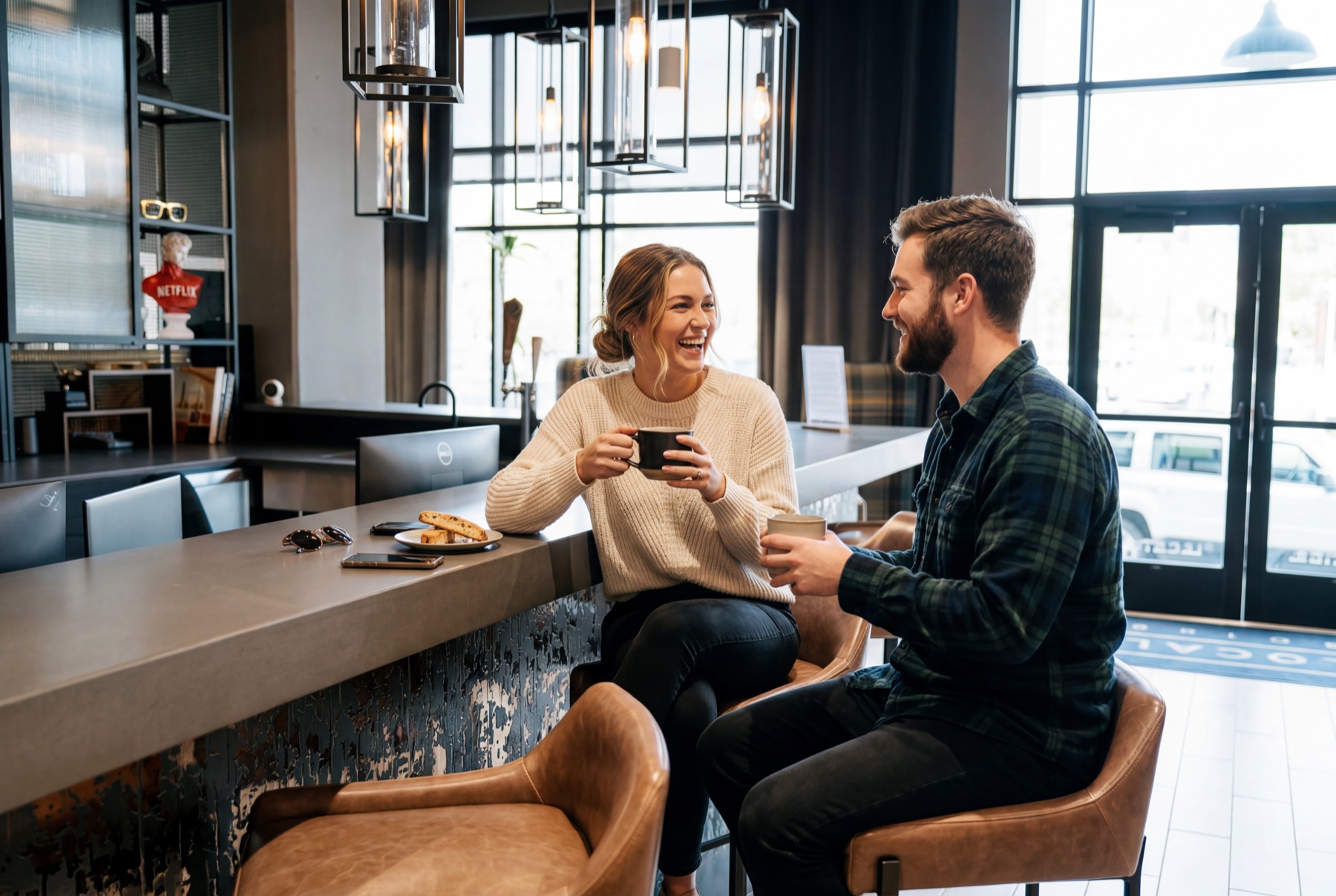 Residents enjoying coffee in a community lounge