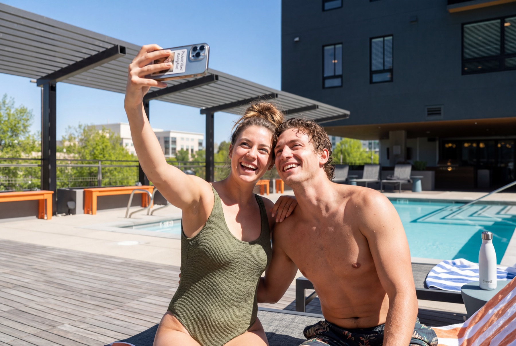 Residents taking a selfie by the pool